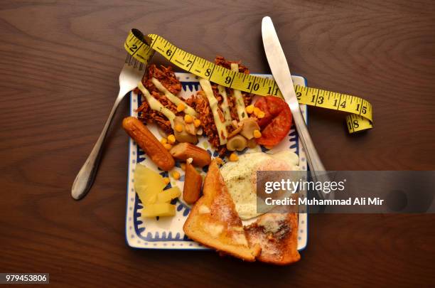 heavy breakfast - plato cuadrado fotografías e imágenes de stock