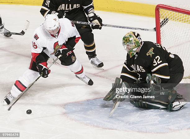 Jesse Winchester of the Ottawa Senators tries to blast one past Kari Lehtonen of the Dallas Stars on March 20, 2010 at the American Airlines Center...