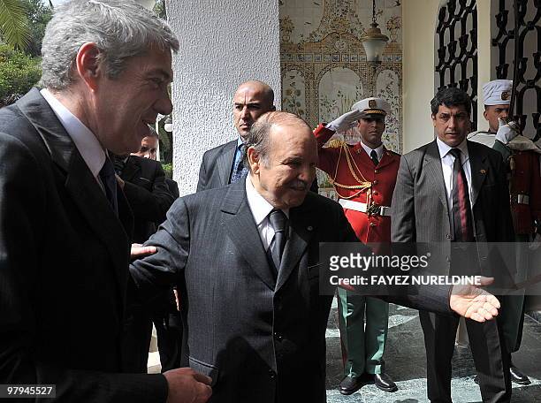Algerian President Abdelaziz Bouteflika escorts Portugal's Prime Minister Jose Socrates during their meeting, on March 22, 2010. Socrates arrived in...