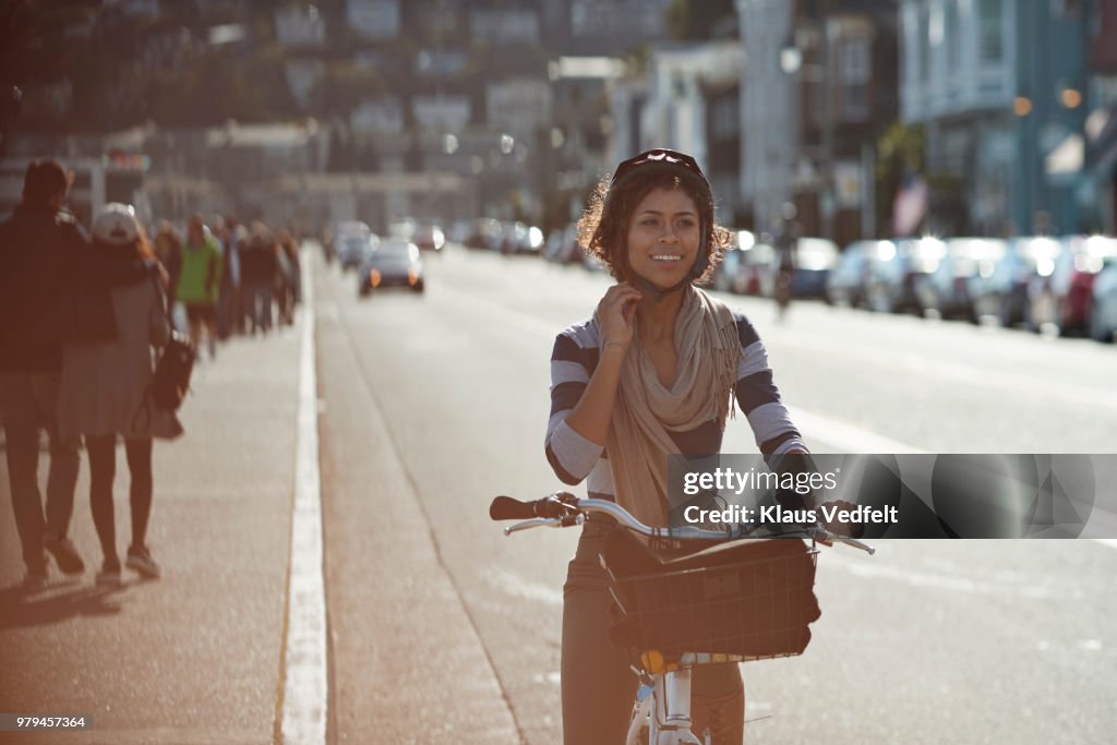 Couple using rental bikes in the small town Sausalito