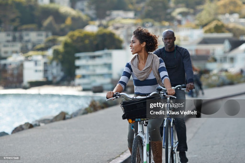 Couple using rental bikes in the small town Sausalito