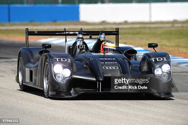 Timo Bernhard of Germany drives the newly revised Audi R15 TDI during testing in preparation for the Le Mans 24 Hours at Sebring International...
