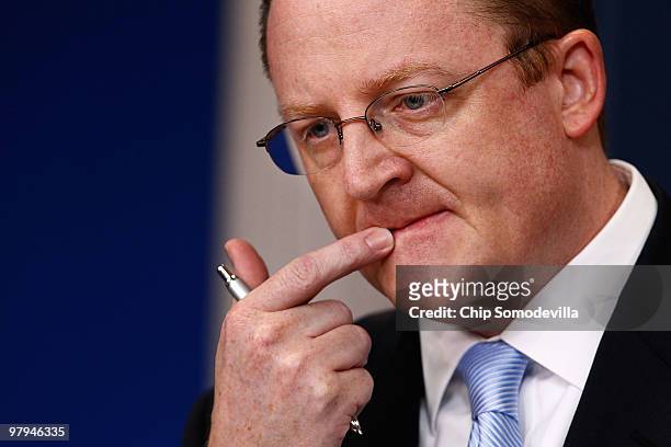 White House Press Secretary Robert Gibbs listens to reporters' questions during his daily press briefing at the White House March 22, 2010 in...