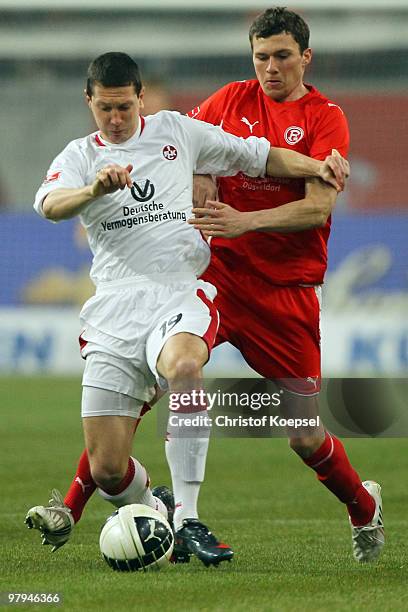 Oliver Fink of Duesseldorf challenges Jiri Bilek of Kaiserslautern during the Second Bundesliga match between Fortuna Duesseldorf and 1. FC...