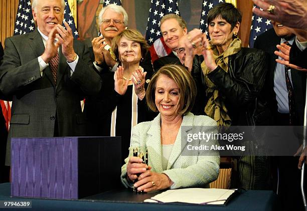 Surrounded by Democratic House members, House Majority Leader Rep. Steny Hoyer , Rep. George Miller , Rep. Louise Slaughter , Rep. Chris Van Hollen ,...