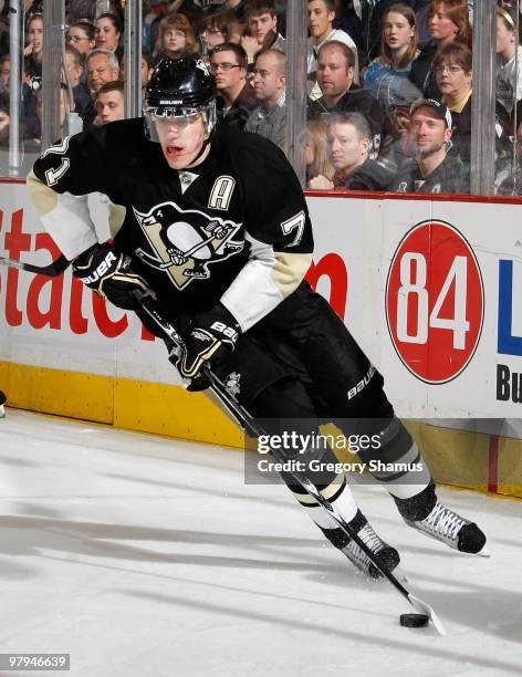 Evgeni Malkin of the Pittsburgh Penguins moves the puck up ice against the Carolina Hurricanes on March 20, 2010 at Mellon Arena in Pittsburgh,...