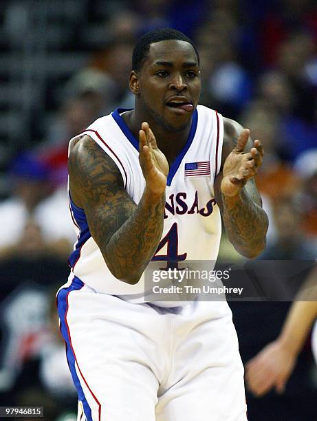 Sherron Collins of the Kansas Jayhawks gets ready to defend against the Texas Tech Red Raiders during the quarterfinals of the 2010 Phillips 66 Big...