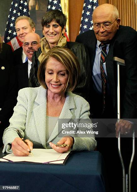 Surrounded by Democratic House members, Rep. Chris Van Hollen , Rep. Henry Waxman , Rep. Rosa DeLauro , and Rep. John Dingell , U.S. Speaker of the...