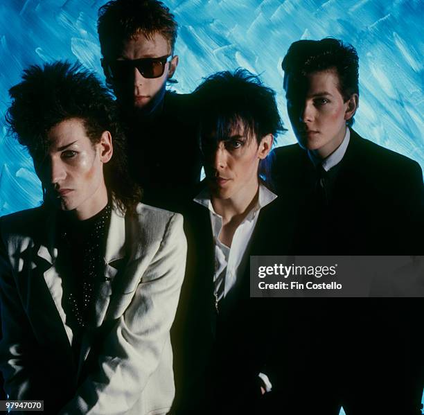 Posed group portrait of Bauhaus. Left to right are Daniel Ash, David J, Peter Murphy and Kevin Haskins in 1982.