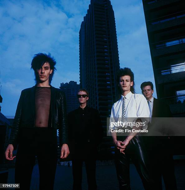 Posed group portrait of Bauhaus in the Barbican. Left to right are Peter Murphy, David J, Daniel Ash and Kevin Haskins in March 1982.