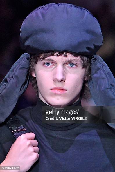 A model walks the runway at the Prada fashion show during Milan Men's ...