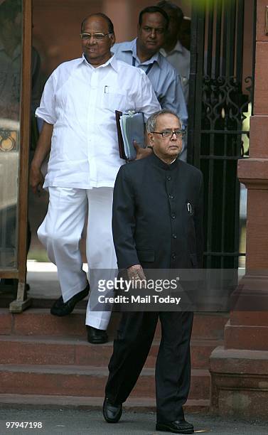 Union Finance Minister Pranab Mukherjee and Union Agriculture and Food Minister Sharad Pawar coming Out After attending the Cabinet Meeting at PM...