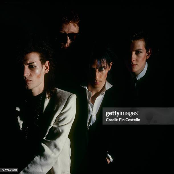 Posed group portrait of Bauhaus. Left to right are Daniel Ash, David J, Peter Murphy and Kevin Haskins in 1982.