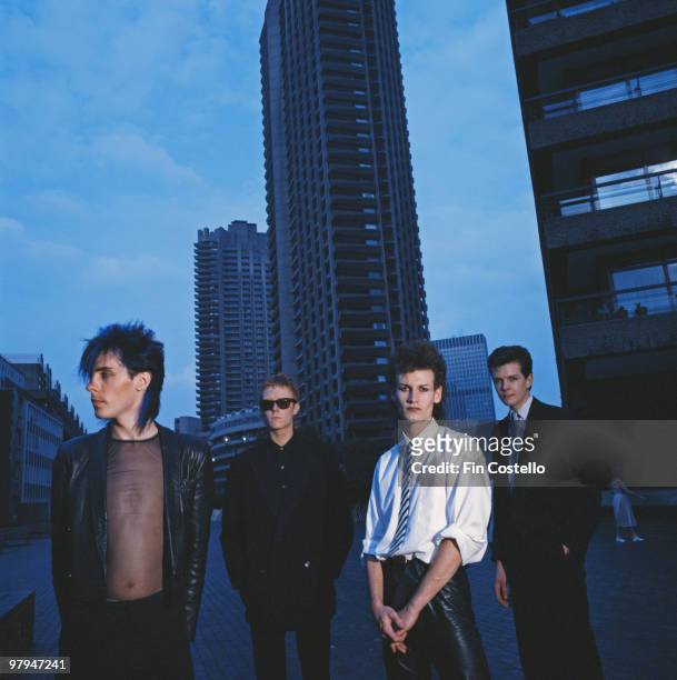 Posed group portrait of Bauhaus in the Barbican. Left to right are Peter Murphy, David J, Daniel Ash and Kevin Haskins in March 1982.