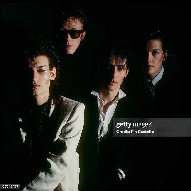 Posed group portrait of Bauhaus. Left to right are Daniel Ash, David J, Peter Murphy and Kevin Haskins in 1982.