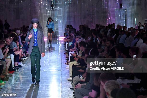 Model walks the runway at the Prada fashion show during Milan Men's Fashion Week Spring/Summer 2019 on June 17, 2018 in Milan, Italy.