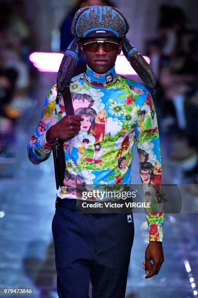 Model walks the runway at the Prada fashion show during Milan Men's Fashion Week Spring/Summer 2019 on June 17, 2018 in Milan, Italy.