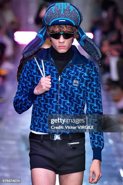 Model walks the runway at the Prada fashion show during Milan Men's Fashion Week Spring/Summer 2019 on June 17, 2018 in Milan, Italy.