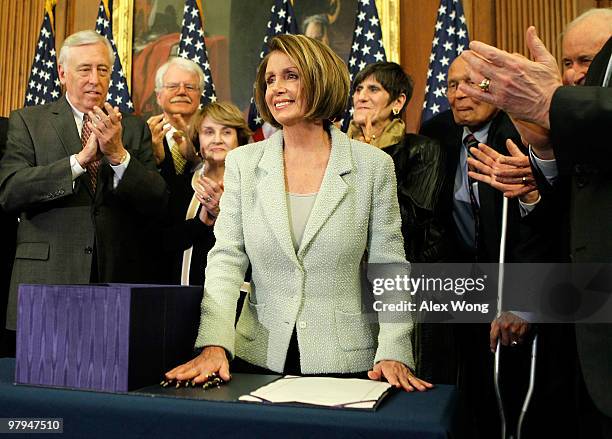 Surrounded by Democratic House members, House Majority Leader Rep. Steny Hoyer , Rep. George Miller , Rep. Louise Slaughter , Rep. Rosa DeLauro , and...