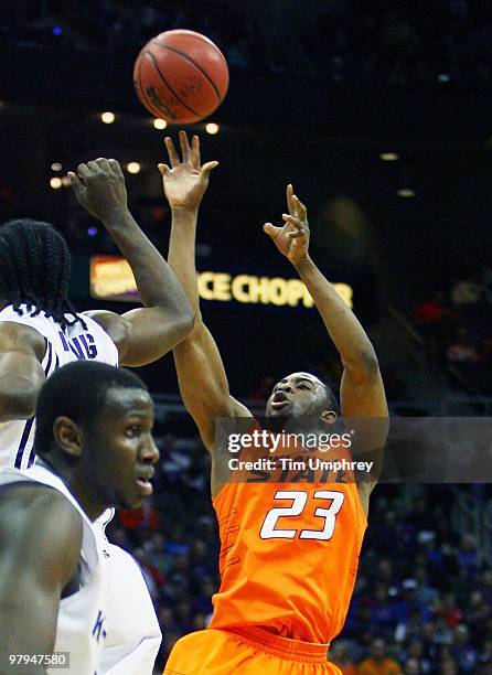 James Anderson of the Oklahoma State Cowboys goes up for a shot against the Kansas State Wildcats during the quarterfinals of the 2010 Phillips 66...