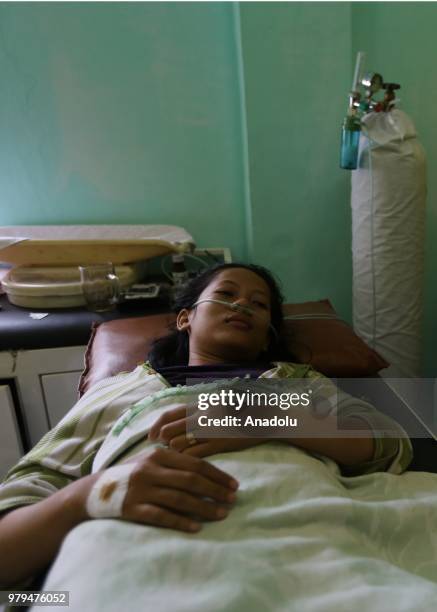 Survivor from the Sinar Bangun Motor Vessel who sank in Lake Toba receives treatment at Simarmata Public Health Center, Samosir Regency, North...