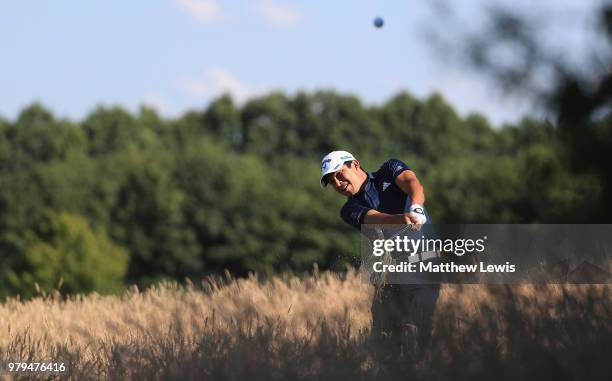 Andres Romero of Argentina plays out of the rough on the 7th hole during a practice round ahead of the BMW International Open at Golf Club Gut...