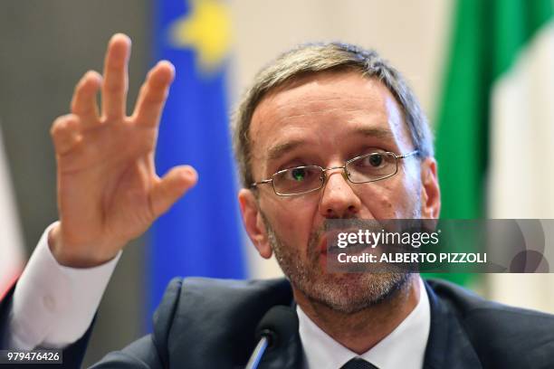 Austria's Interior Minister Herbert Kickl speaks during a joint press conference with Austria's Vice Chancellor and Italy's Interior Minister and...