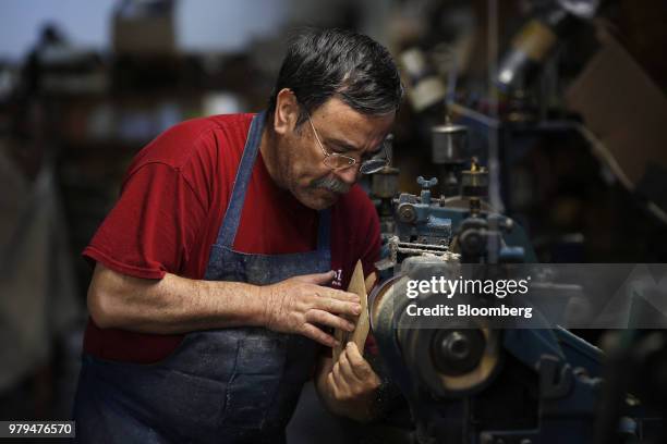 Worker prepares material while making leather boots at the Dehner Co. Factory in Omaha, Nebraska, U.S., on Tuesday, June 5, 2018. Markit is scheduled...