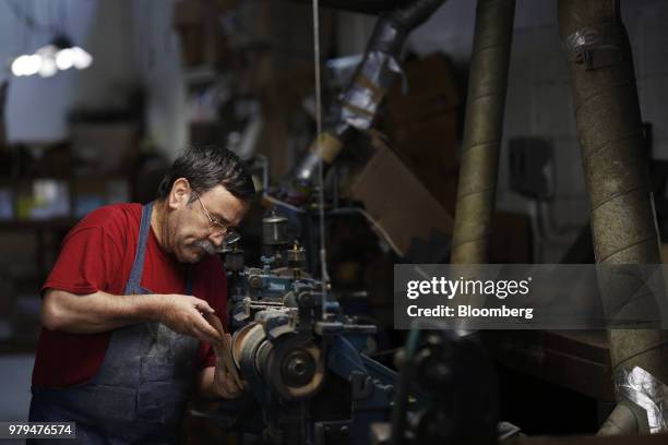 Worker prepares material while making leather boots at the Dehner Co. Factory in Omaha, Nebraska, U.S., on Tuesday, June 5, 2018. Markit is scheduled...