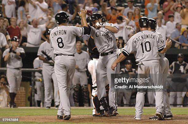 Chicago White Sox first baseman Ross Gload celebrates a ninth inning game ending grand slam home run against the Baltimore Orioles July 28, 2006 in...