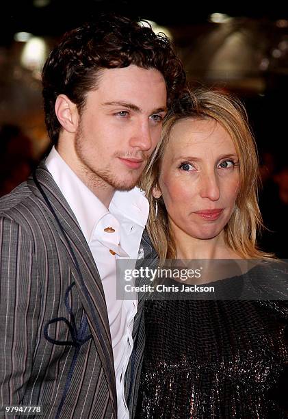 Actor Aaron Johnson and artist Sam Taylor Wood arrives at the 'Kick Ass' Premiere at the Empire Leicester Square on March 22, 2010 in London, England.