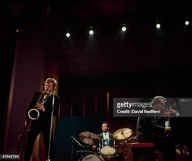 American jazz pianist and composer Dave Brubeck performs live on stage with the Dave Brubeck Quartet, featuring saxophonist Gerry Mulligan , drummer...