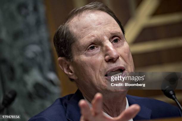 Senator Ron Wyden, a Democrat from Oregon and ranking member of the Senate Finance Committee, questions Wilbur Ross, U.S. Commerce secretary, not...
