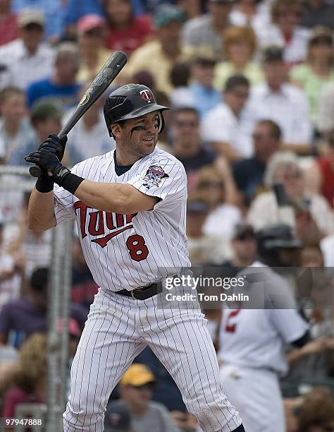 Nick Punto of the Minnesota Twins bats against the Tampa Bay Rays at Lee County Sports Complex on March 21, 2010 in Fort Myers, Florida.