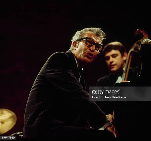 American jazz pianist and composer Dave Brubeck performs live on stage with Dave Brubeck quartet bassist Jack Six circa 1970.