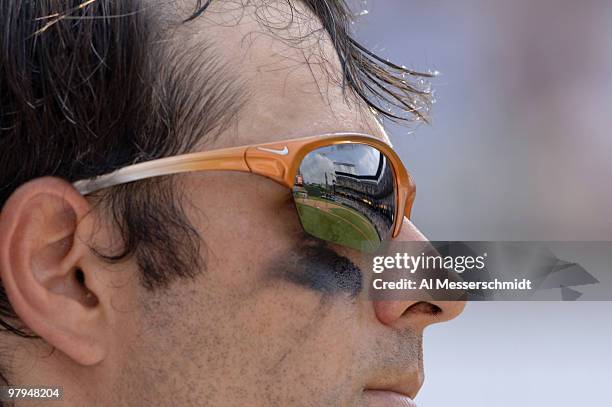 Baltimore Orioles second baseman Brian Roberts sunglasses are a perfect reflection of the ballpark during play against the Chicago White Sox July 30,...