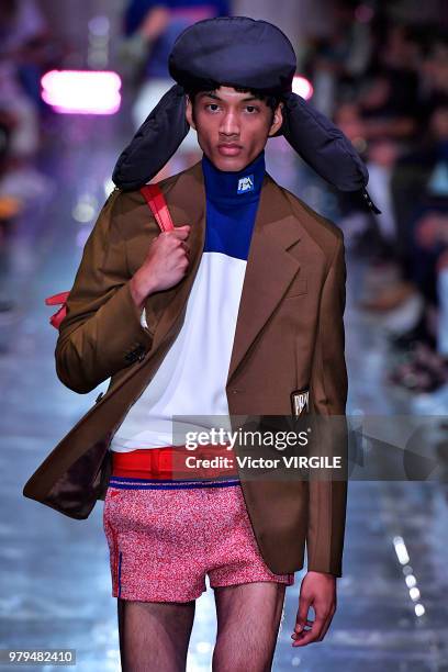 Model walks the runway at the Prada fashion show during Milan Men's Fashion Week Spring/Summer 2019 on June 17, 2018 in Milan, Italy.