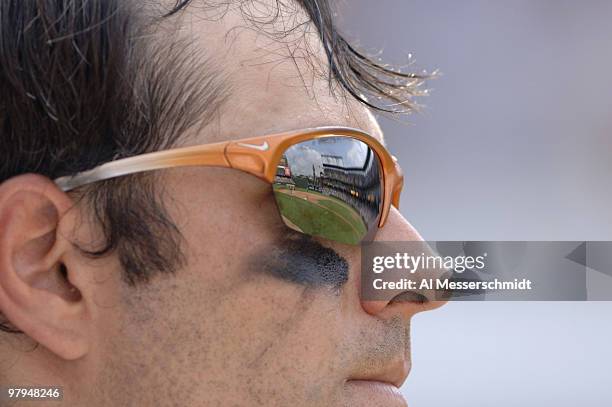 Baltimore Orioles second baseman Brian Roberts sunglasses are a perfect reflection of the ballpark during play against the Chicago White Sox July 30,...