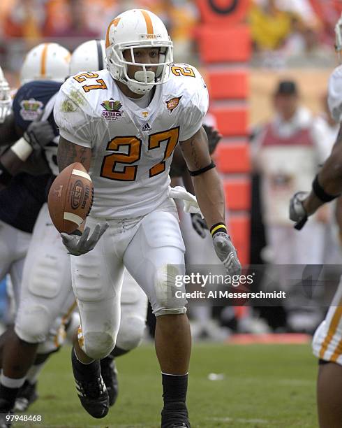 Tennessee tailback Arian Foster bobbles a handoff on a reverse play during the 2007 Outback Bowl between Penn State and Tennessee at Raymond James...