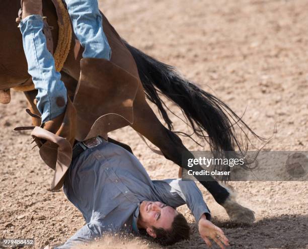 947 Horse Rider Falling Off Horseback Stock Photos, High-Res Pictures ...
