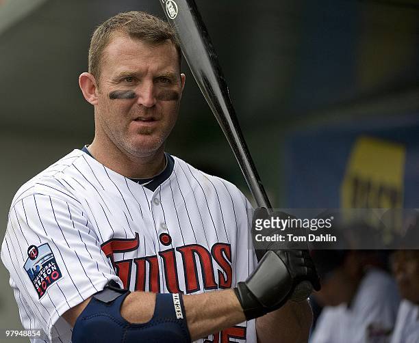 Jim Thome of the Minnesota Twins prepares to go on deck in a game against the Tampa Bay Rays at Lee County Sports Complex on March 21, 2010 in Fort...