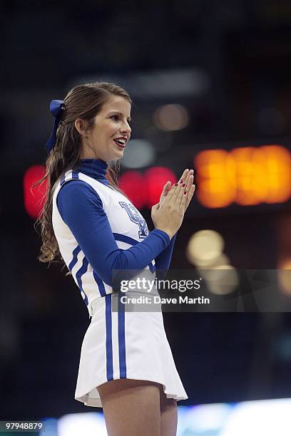 Cheerleader of the Kentucky Wildcats performs during the second round of the 2010 NCAA men's basketball tournament at the New Orleans Arena on March...
