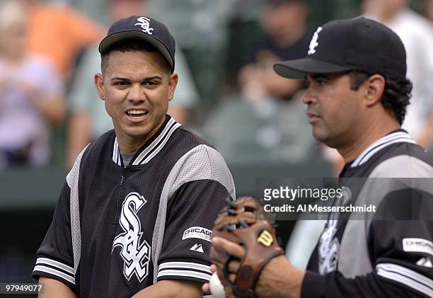 Chicago White Sox shortstop Alex Clinton and manager Ozzie Guillen before play against the Baltimore Orioles July 28, 2006 in Baltimore, Maryland....