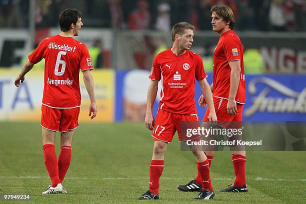 Jens Langeneke, Andreas Lambertz and Dmitri Bulykin of Duesseldorf look dejected after the 0-0 draw of the Second Bundesliga match between Fortuna...