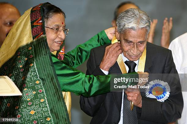 President Pratibha Patil presenting the Dadasaheb Phalke Award to cinematographer VK Murthy, during the 56th National Film awards, in New Delhi,...