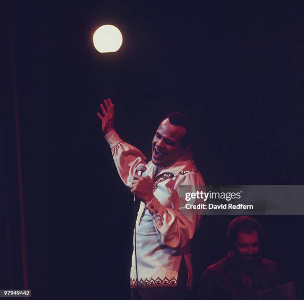 American singer and actor Harry Belafonte performs live on stage during the Royal Variety Performance at the Palladium Theatre in London on 21st...