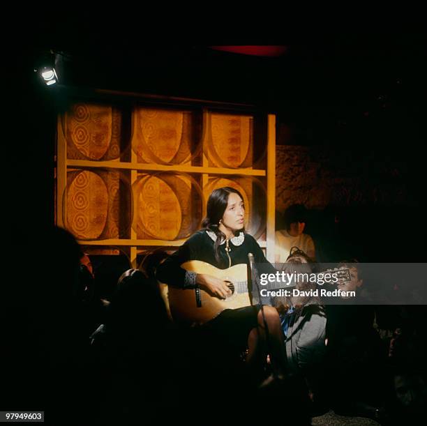 American folk singer Joan Baez performs on a television show circa 1965.