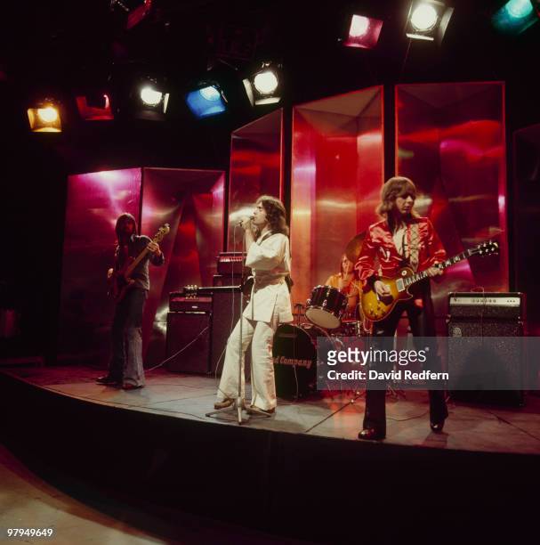 Boz Burrell, Paul Rodgers, Simon Kirke and Mick Ralphs of Bad Company perform on the BBC television show 'Top of the Pops' in June 1974.
