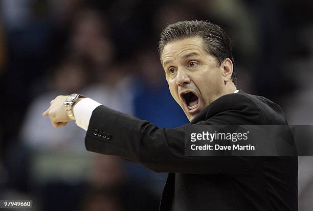 Coach John Calipari of the Kentucky Wildcats talks to his team during the second round of the 2010 NCAA men's basketball tournament at the New...