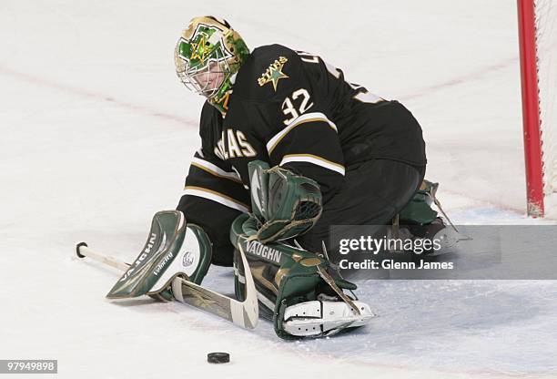 Kari Lehtonen of the Dallas Stars kicks aside a shot against the Ottawa Senators on March 20, 2010 at the American Airlines Center in Dallas, Texas.